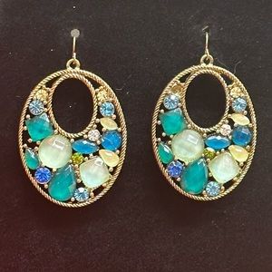 Earring with green and white stones